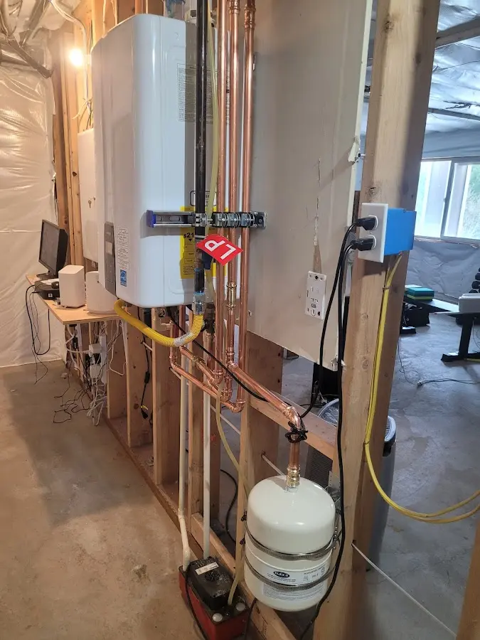 Licensed plumber repairing a kitchen sink in Watford City