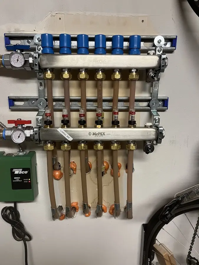 Plumber performing Water Heater Repair at a residential property in Watford City